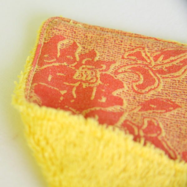 Maxi lingette zéro déchet réutilisable tissu jaune imprimé de fleurs oranges et éponge jaune